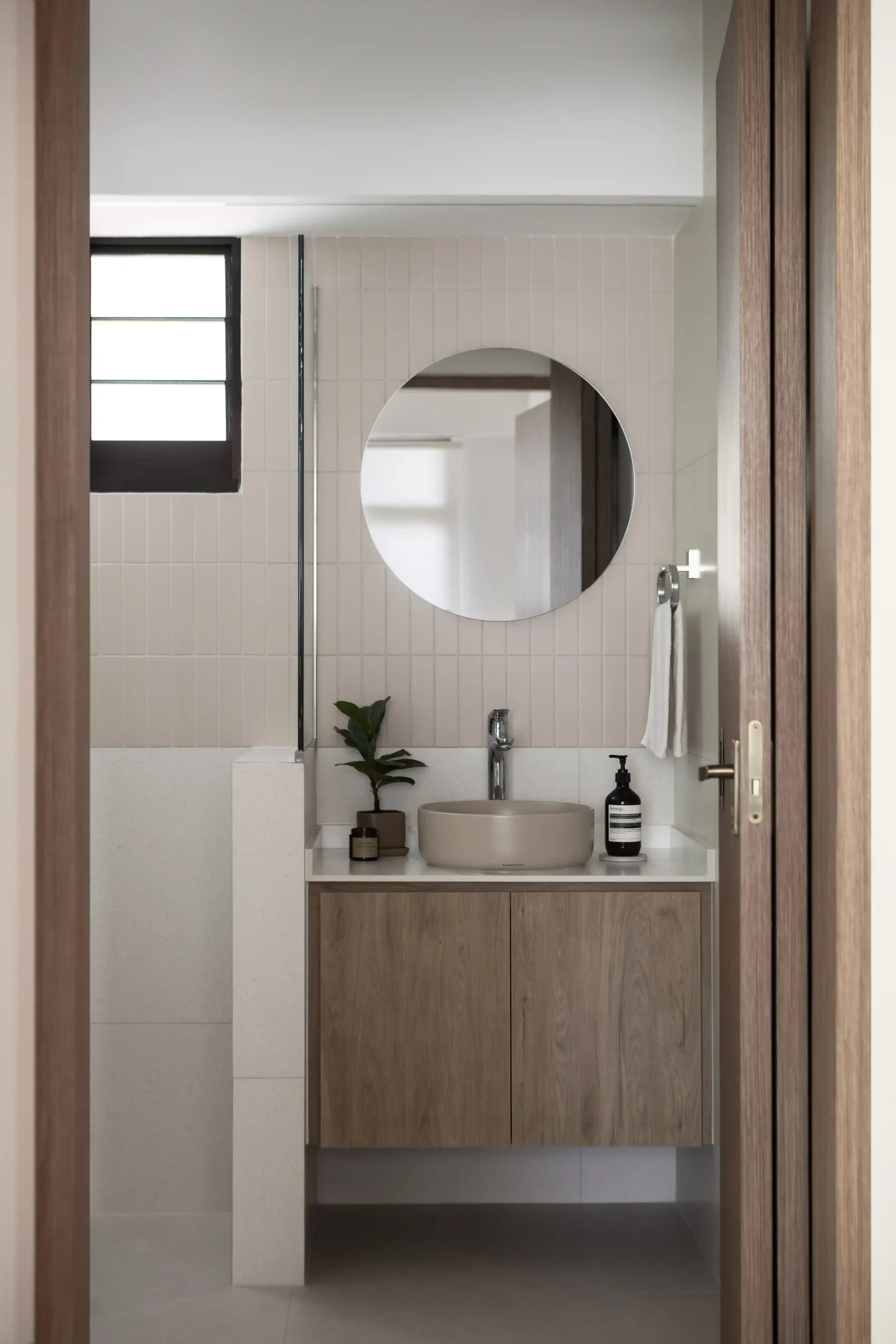 Organic modern bathroom vanity with a wooden cabinet