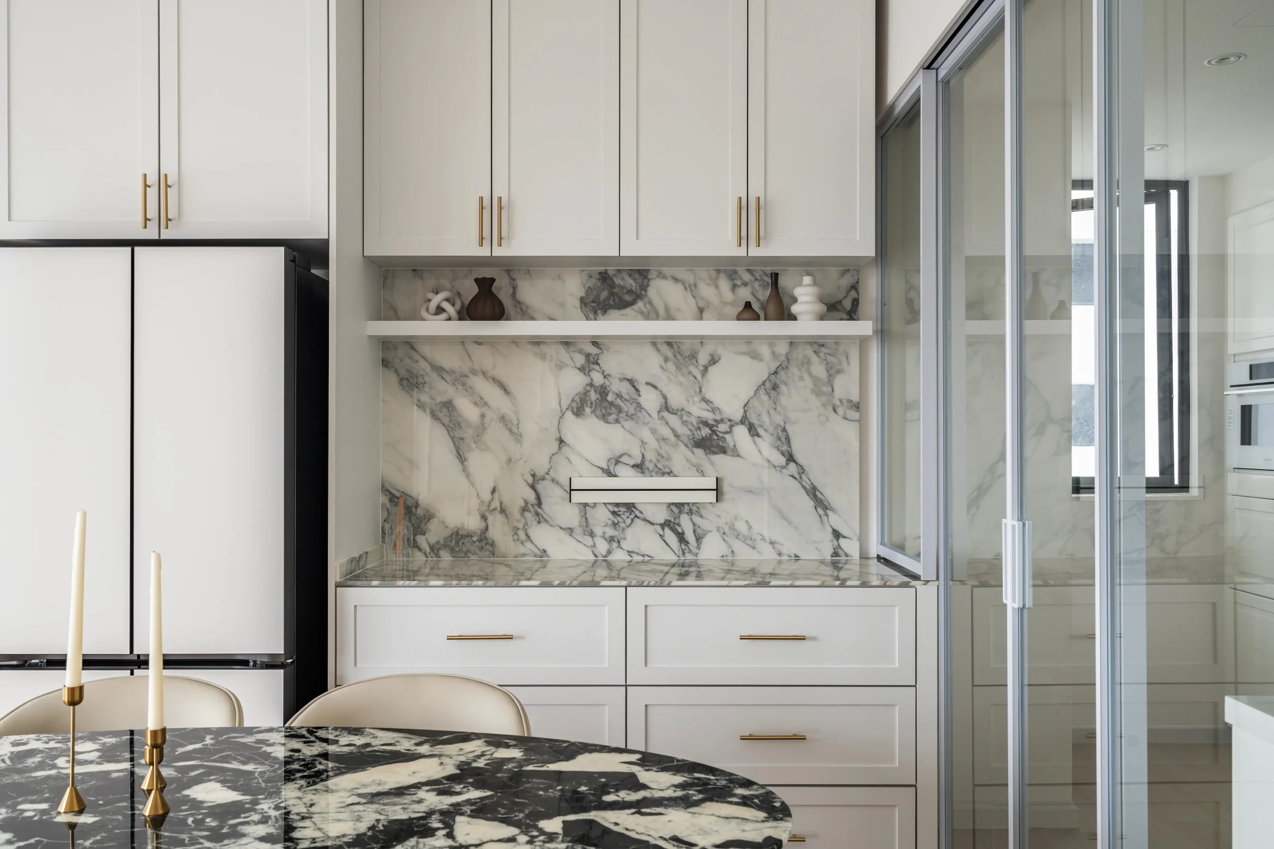 Dining cabinet storage with marble finishes in a refined Modern Parisian interior