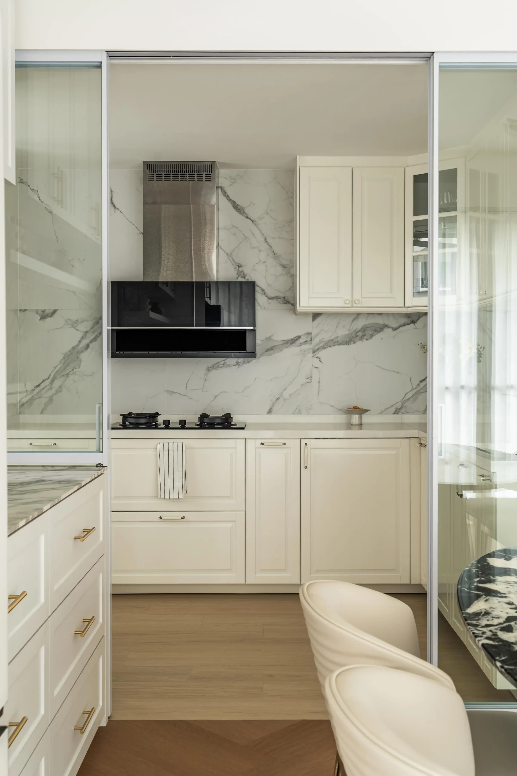 Modern Parisian kitchen with seamless cabinetry and refined textures