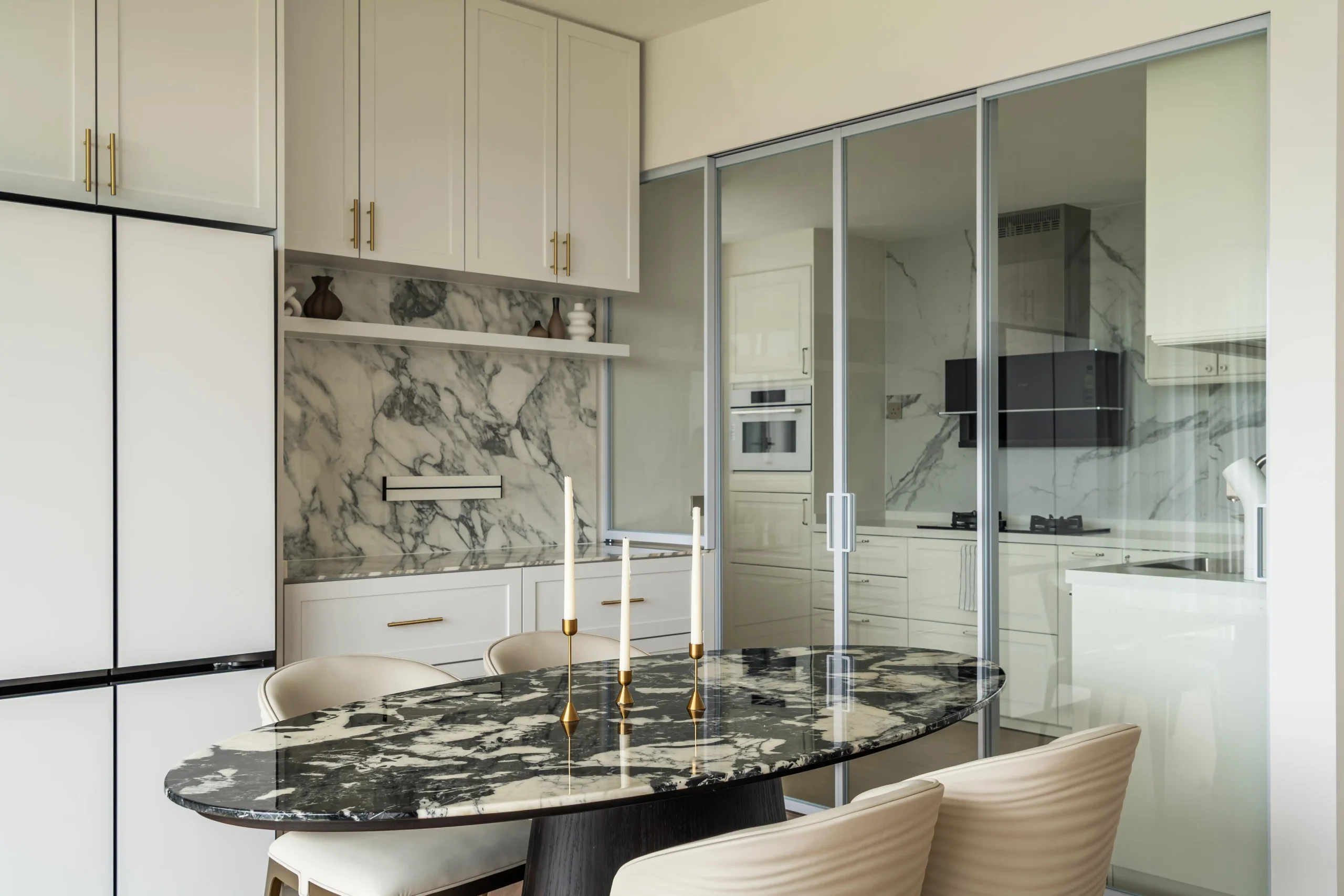 Dining space with marble finishes, and Modern Parisian-inspired details