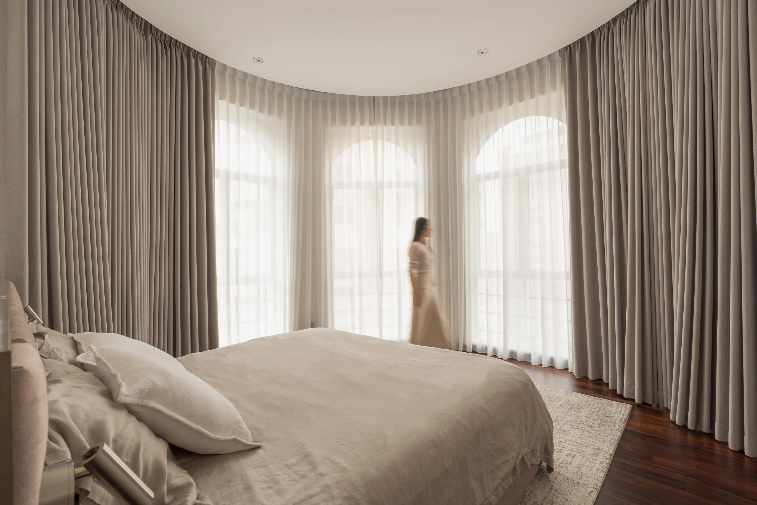 Minimalist bedroom interior with calm tones and simple, uncluttered design
