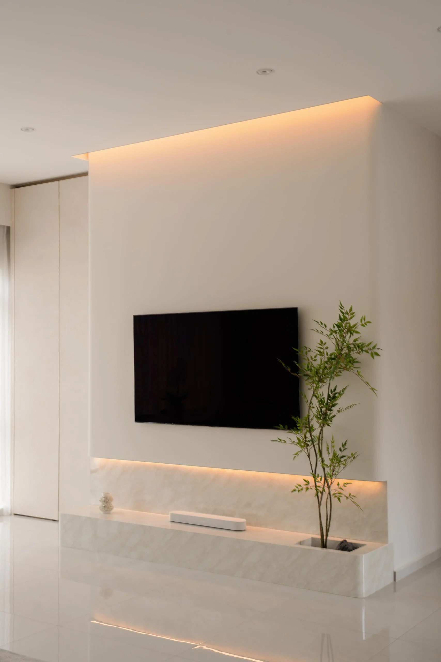 Minimalist house interior with sleek built-in TV console and clean lines
