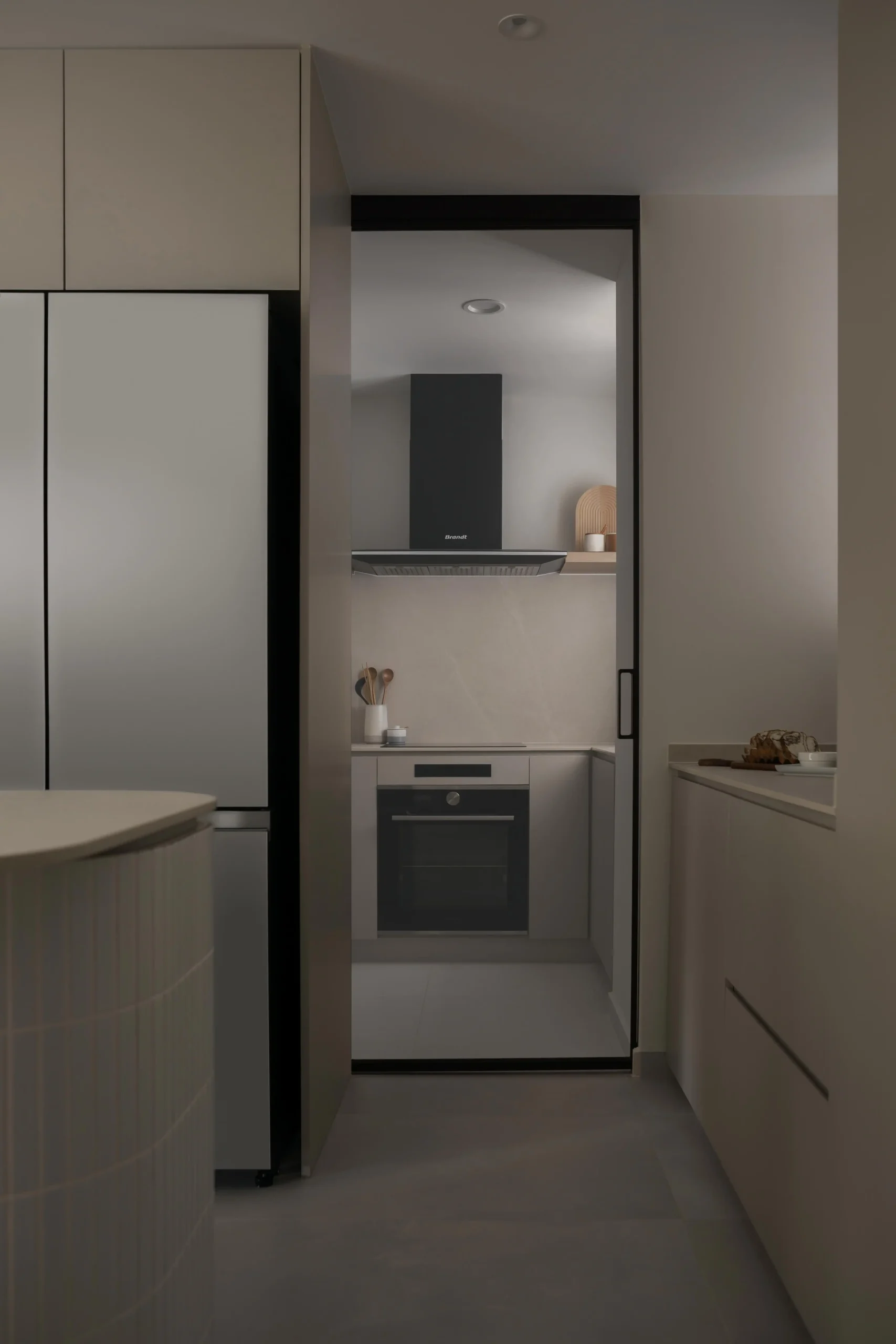 Black-framed sliding glass door opening into a compact modern japandi kitchen.